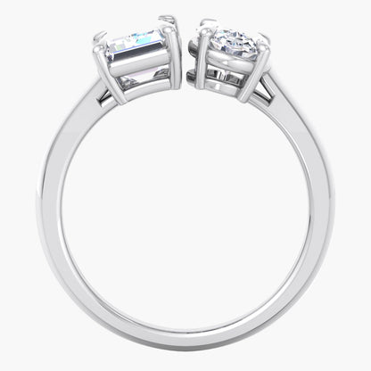 Silver ring with two diamonds on a white background