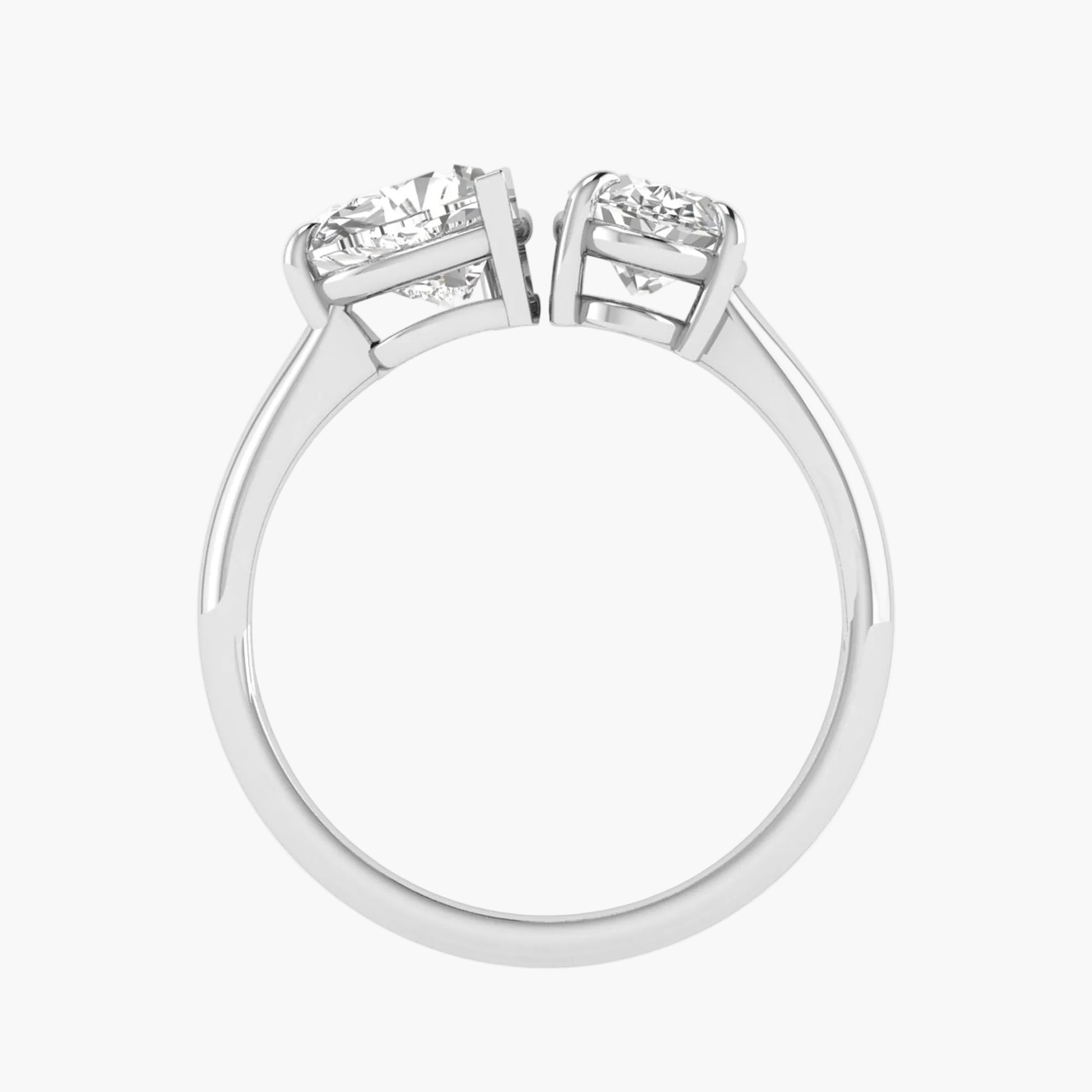 Diamond ring with two smaller diamonds on a white background