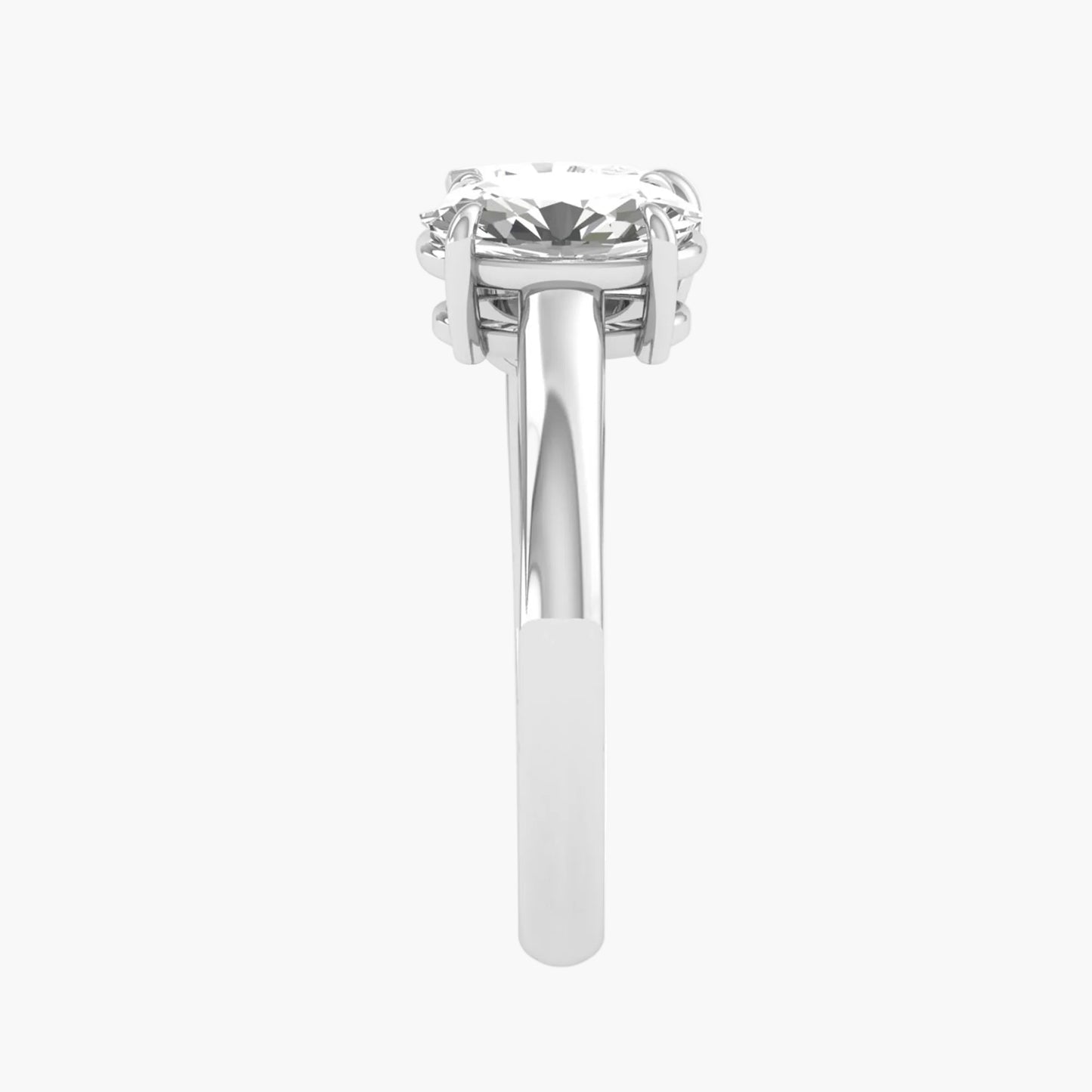 Silver ring with a large diamond on a white background