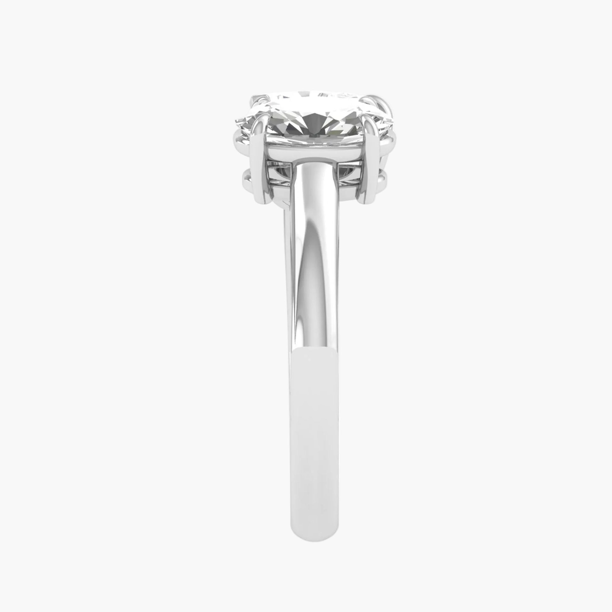 Silver ring with a large diamond on a white background
