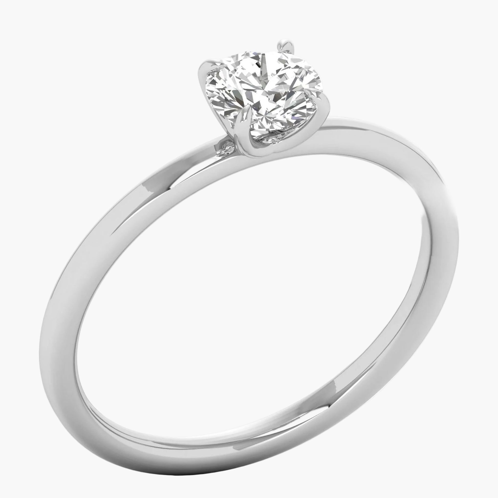 Diamond ring with a white gold band on a white background