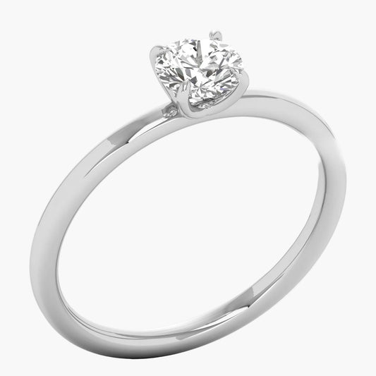 Diamond ring with a white gold band on a white background