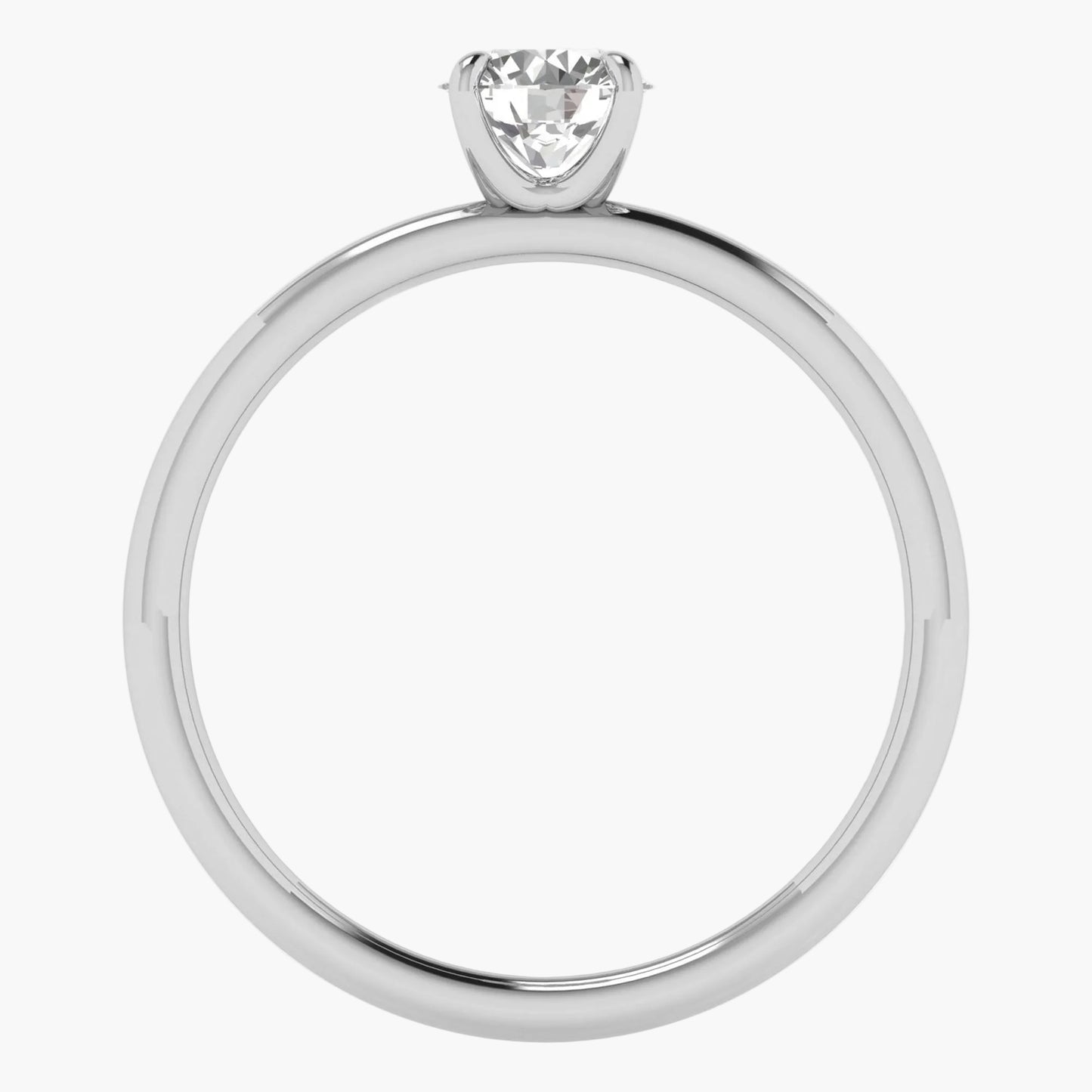 Diamond ring with a heart-shaped center stone on a white background