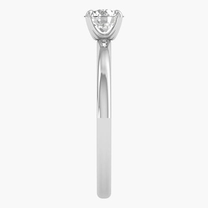 Silver ring with a diamond on a white background
