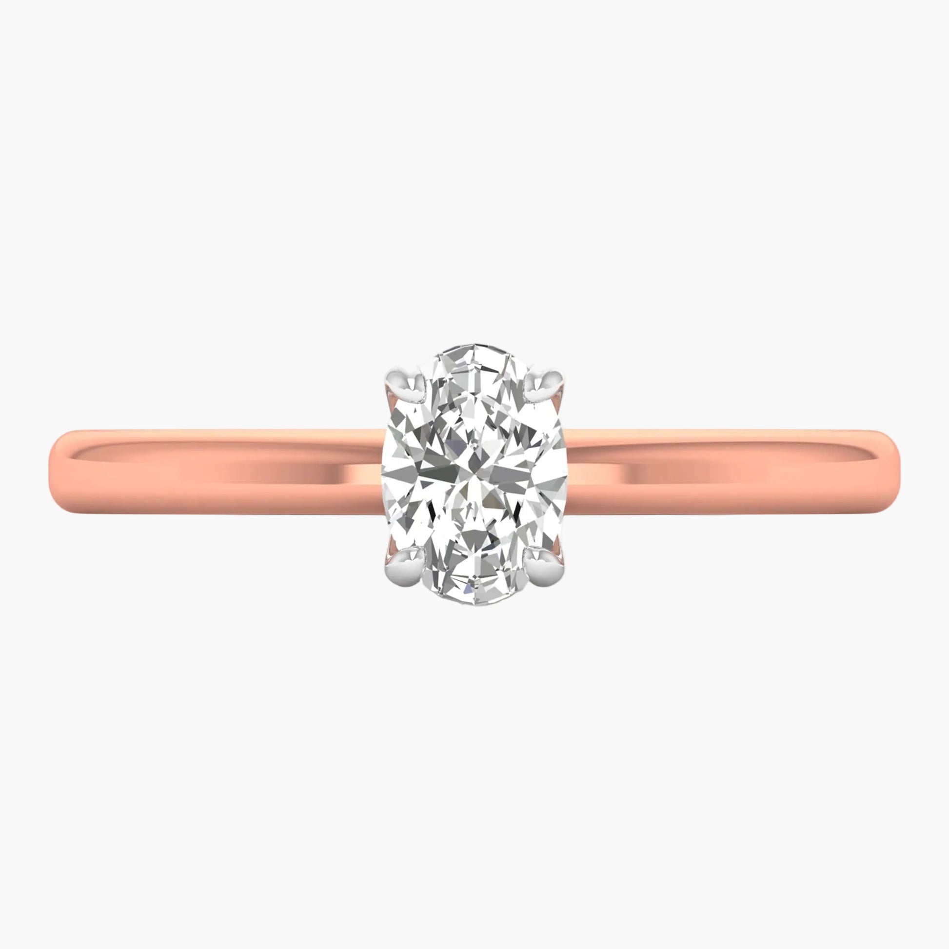 Rose gold ring with a diamond on a white background