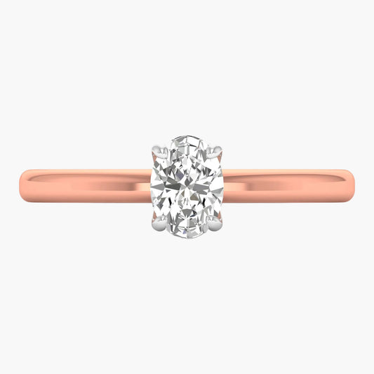 Rose gold ring with a diamond on a white background