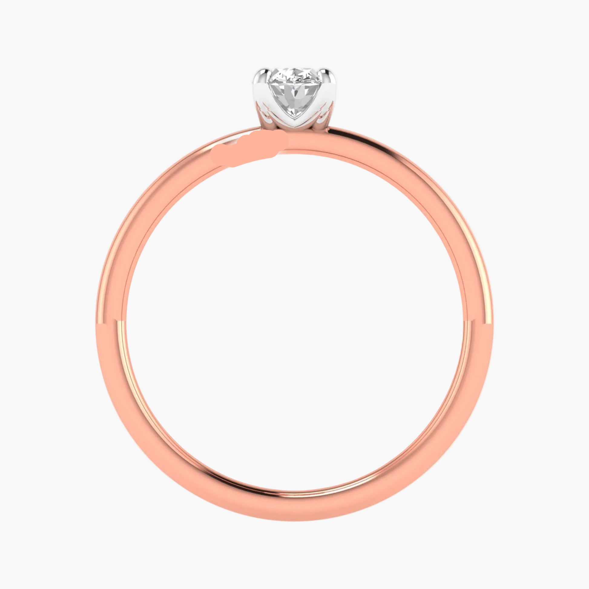 Rose gold ring with a heart-shaped diamond on a white background