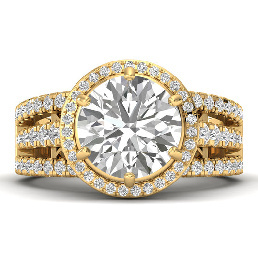 Gold diamond ring with a large central gemstone and smaller diamonds on a white background
