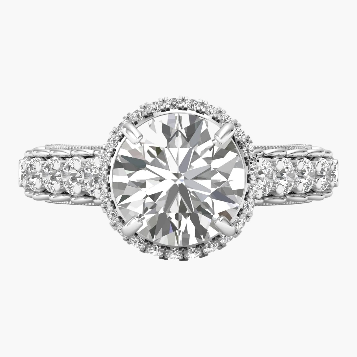 Diamond ring with a large central gemstone and smaller stones on a white background