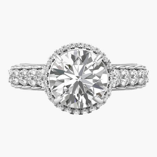 Diamond ring with a large central gemstone and smaller stones on a white background