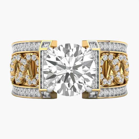 Gold and silver ring with a large diamond and smaller diamonds on the band against a white background