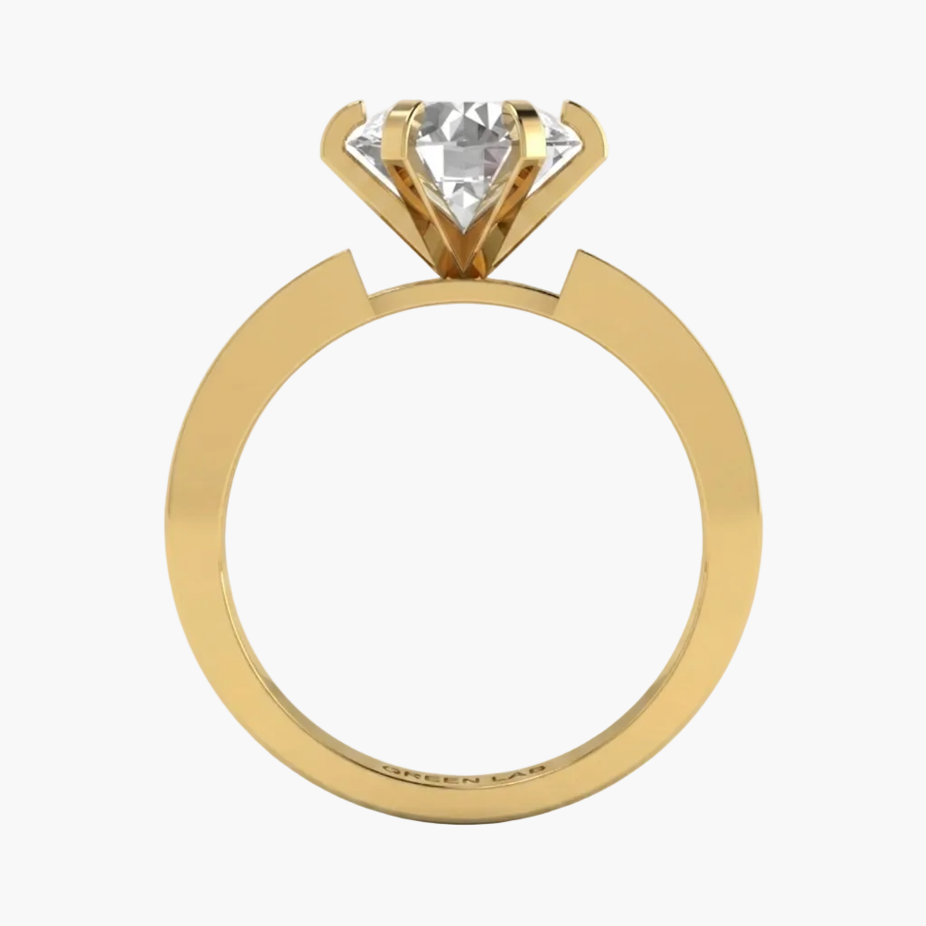 Gold ring with a diamond on a white background, featuring 'Green Lab' branding.