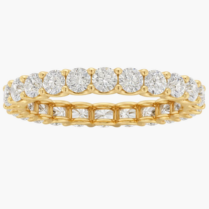 Gold ring with diamonds on a white background