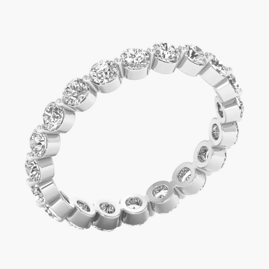 Silver ring with diamonds on a white background