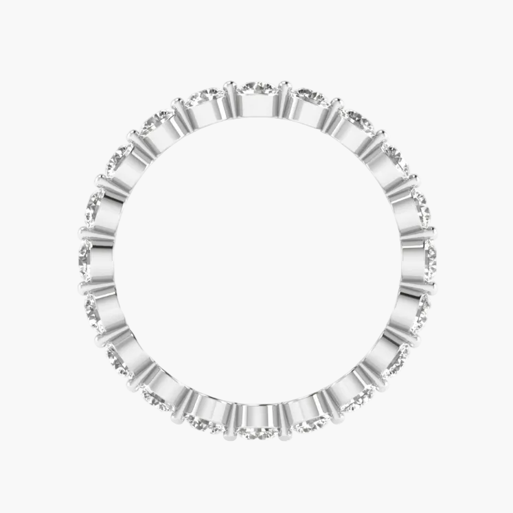 Silver ring with a white gemstone on a white background