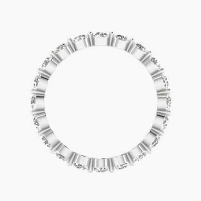 Silver ring with a white gemstone on a white background