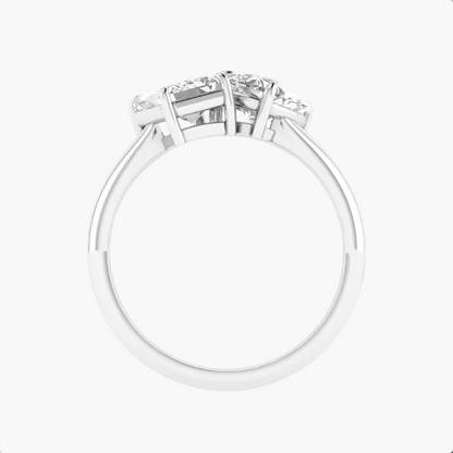 Diamond ring with three stones on a white background