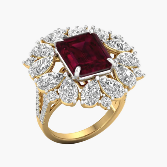 Gold ring with a red gemstone and diamond accents on a white background