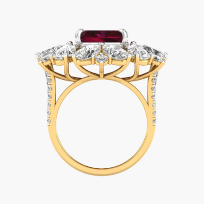 Gold ring with a red gemstone and diamond accents on a white background