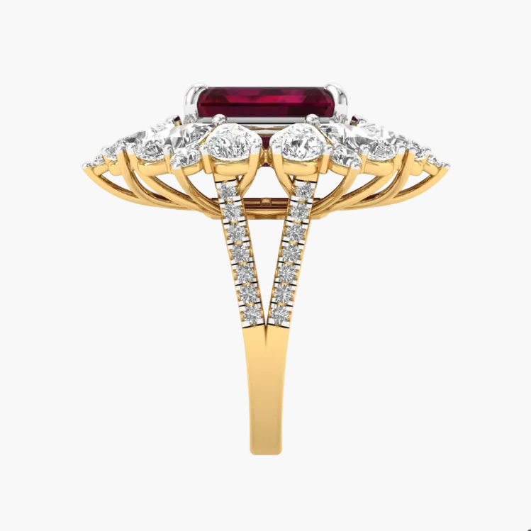 Gold ring with a red gemstone and diamond-studded band on a white background