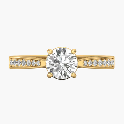 Gold ring with a large diamond and smaller diamonds on the band against a white background