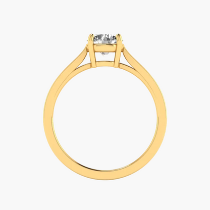 Gold ring with a diamond on a white background