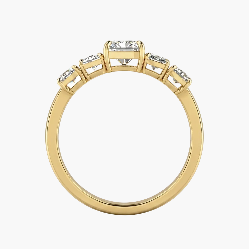 Gold ring with diamonds on a white background