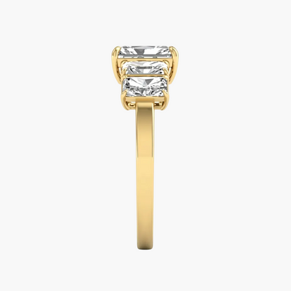 Gold ring with a large diamond on a white background