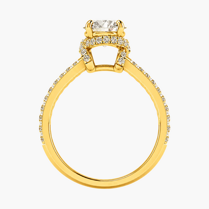 Gold ring with a diamond on a white background