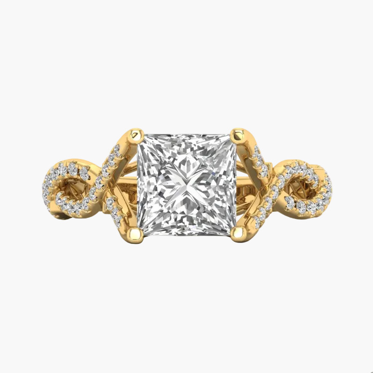 Gold ring with a large diamond and smaller diamonds on the band against a white background