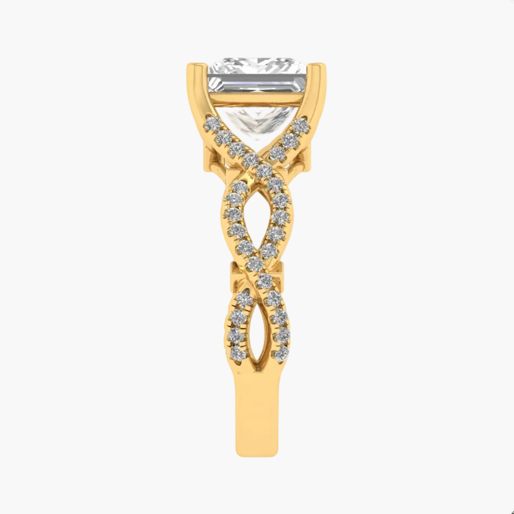 Gold ring with a central diamond and intricate design on a white background