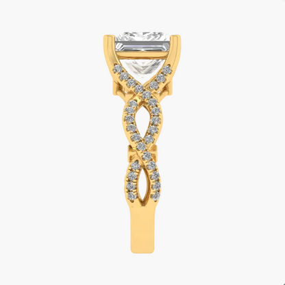 Gold ring with a central diamond and intricate design on a white background