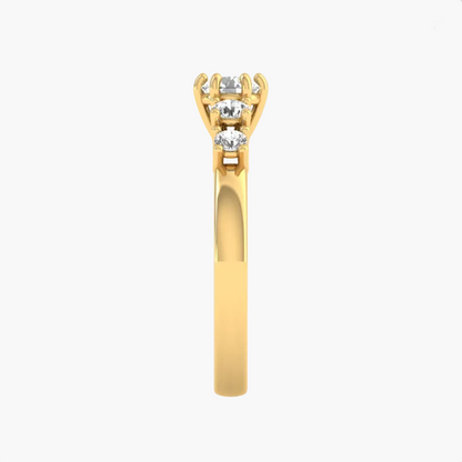 Gold ring with three diamonds on a white background