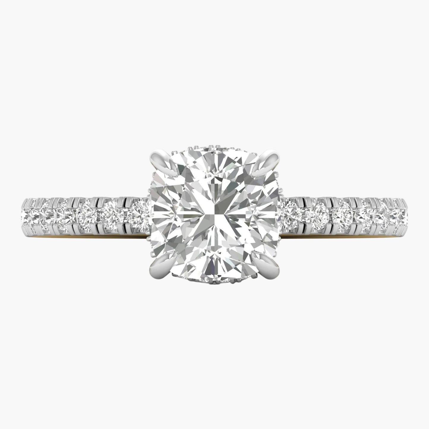 Diamond ring with a large central gemstone and smaller stones on the band against a white background
