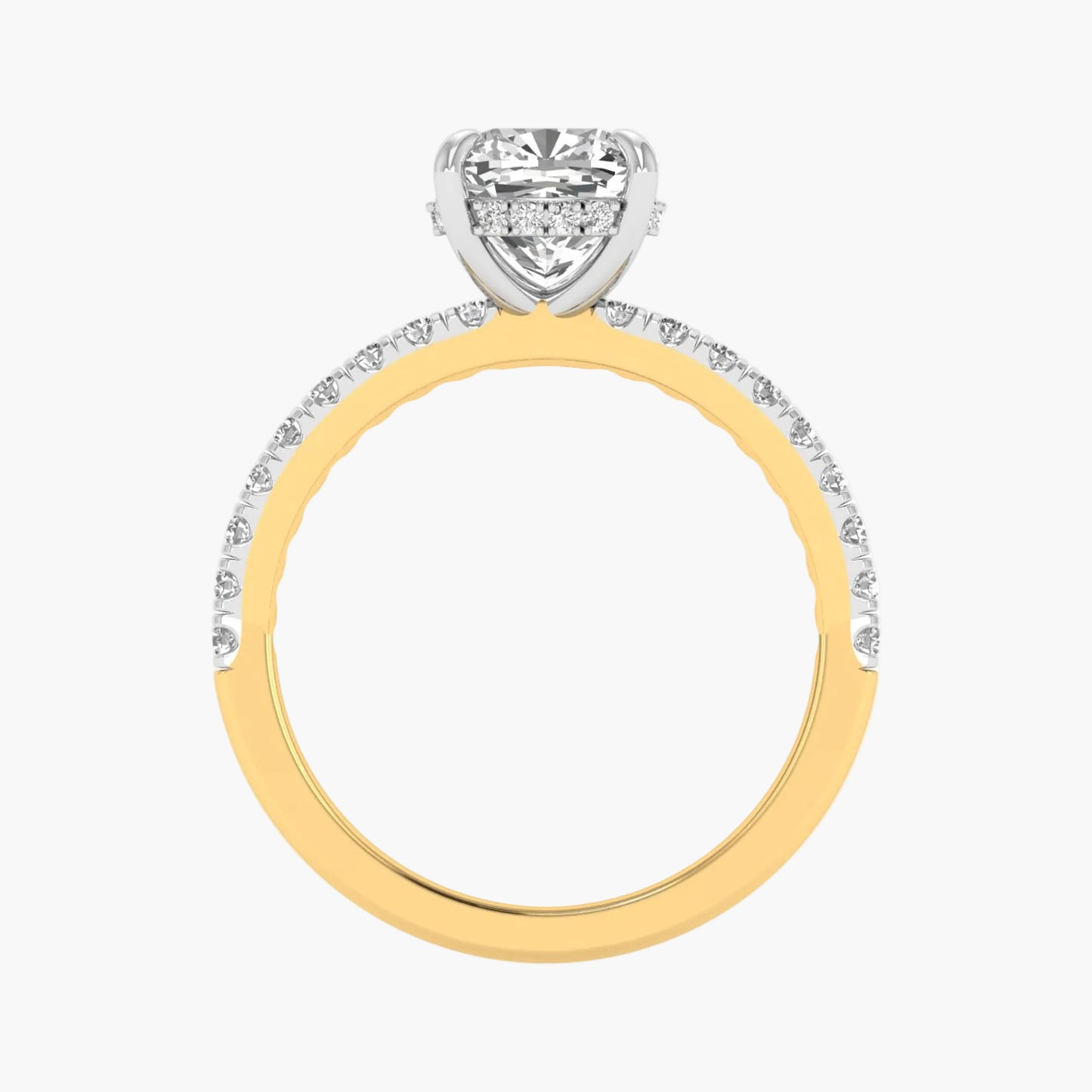 Two-tone gold ring with a diamond heart-shaped center on a white background