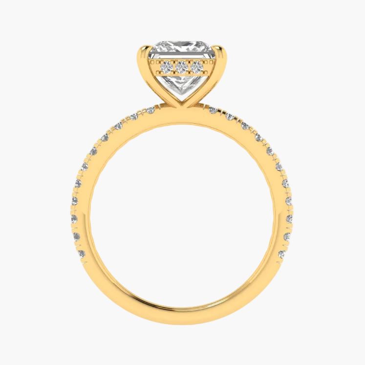 Gold ring with a diamond on a white background