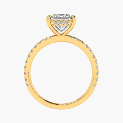 Gold ring with a diamond on a white background