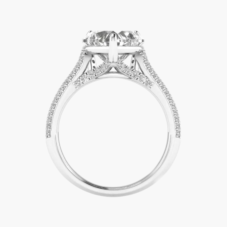 Diamond ring with a large central stone and smaller stones on the band against a white background