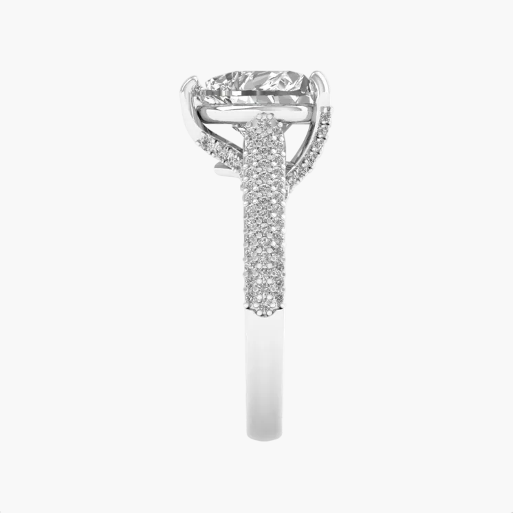 Close-up of a diamond ring on a white background with a blurred product cart and website navigation bar in the foreground.