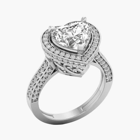 Silver ring with a large central diamond and smaller diamonds on the band against a white background