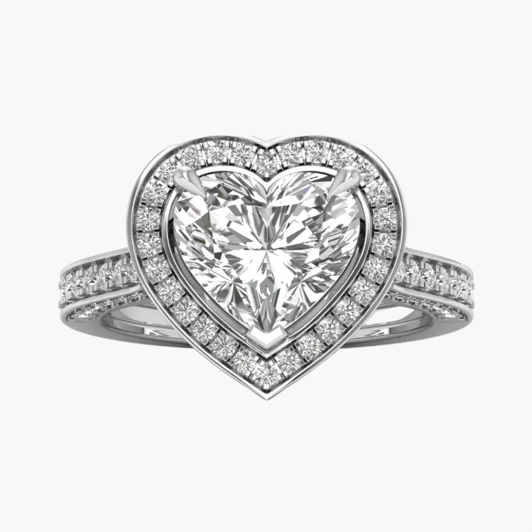 Heart-shaped diamond ring with a white background