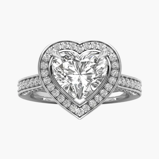 Heart-shaped diamond ring with a white background