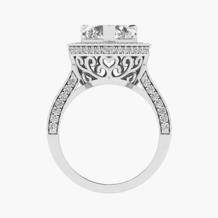 Silver ring with intricate design and diamond accents on a white background