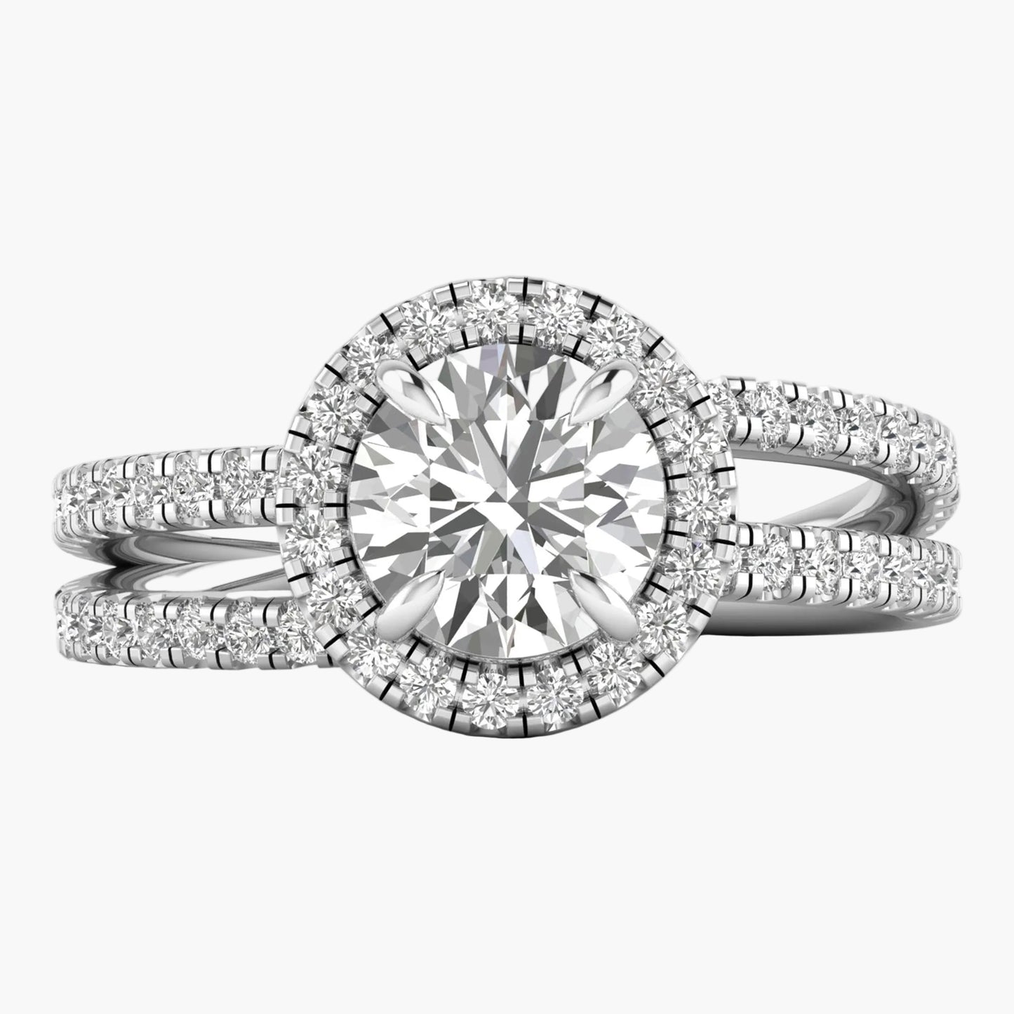 Diamond ring with a halo setting on a white background