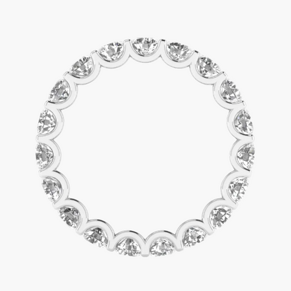 Silver ring with clear gemstones on a white background