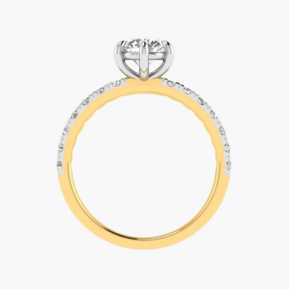Two-tone gold and silver ring with diamond accents on a white background