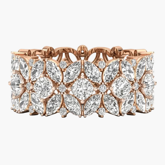 Rose gold bracelet with diamond flowers on a white background