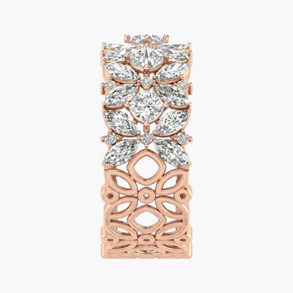 Rose gold and clear gemstone decorative piece on a white background