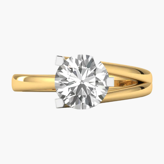 Gold ring with a large diamond on a white background