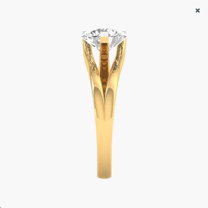Gold ring with a diamond on a white background